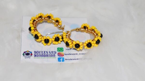 Argollas con diseño de girasoles